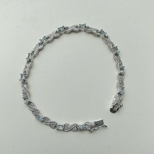 Silver, blue topaz bracelet